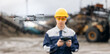 © Parilov - Closeup drone monitoring for efficient sand quarry and ore mining by surveying engineer