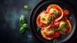 © mila103 - Delicious ravioli with tomato sauce and basil garnish on dark plate.