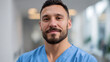 © Vika art - Portrait of smiling male healthcare expert.