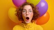 © mila103 - Surprised young caucasian female with curly hair and colorful balloons.