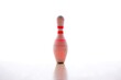 © Arif - Single red bowling pin