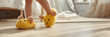 © tanya78 - a child's feet in soft slippers with ears on the floor in a room
