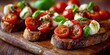 © MNStudio - Italian bruschetta with cherry tomatoes, mozzarella, basil, and olive oil on rustic bread. Bold red, green and white food styling celebrating fresh Mediterranean flavor.