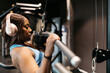 © ADDICTIVE STOCK - Woman training at hotel gym with focus and style