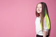 © New Africa - Cute girl with bright clip-in hair extensions on pink background. Space for text