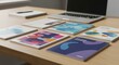 © antuanetto - Colorful college brochures featuring abstract designs laid out on a wooden desk with a laptop, embodying the college admissions and educational journey concept.