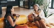 © Azeemud25/peopleimages.com - Tea, mature women and friends in living room for conversation, gossip or bonding together on weekend. Happy people, talking and relax with coffee on sofa in home for catch up, story and advice