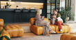 © Azeemud25/peopleimages.com - Friends, women and discussion with coffee on couch, storytelling and weekend visit for connection. Home, gossip session and mature people with tea drinks for reunion, conversation and recall memory