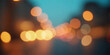 © Alpha Designs - A vibrant abstract bokeh background features colorful defocused city lights and glowing circles that create a bright blurred texture for a shiny Christmas holiday celebration or night decoration