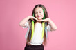 © New Africa - Cute girl with bright clip-in hair extensions on pink background