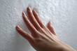 © Petr - Close-up hand pressing soft silicone, elastic deformation and fine surface texture