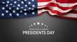© Stocker Man - Patriotic banner featuring the waving american flag draped above bold white text honoring united states presidents day celebration