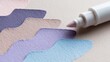 © Toto - Marker pen touches wavy pastel paper samples for art creation.