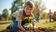 © Maryna - Young boy scout plants seedling in park. Kids help community, grow trees outdoors. Child learns nature, environmental care, gardening skills.