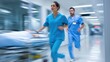 © OleksandrZastrozhnov - Blurred in motion medical emergency: asian female nurse and caucasian male doctor in action