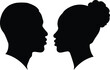 © Iqrar - Striking black silhouette profile portraits of an african man and woman facing each other intimately against a stark white background representing love and connection.