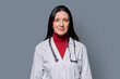 © Valerii Honcharuk - Portrait of serious female doctor in white lab coat with stethoscope on gray background