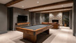 © Viktor - Rustic basement room features pool table near fireplace and leather sofa. Exposed wood beams on ceiling, stone wall. Entertainment space with TV.