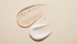 © Husen - Cosmetic creams and serums on a neutral beige background.