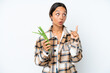 © luismolinero - Young hispanic woman holding a green beans isolated on white background thinking an idea while looking up