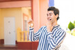 © luismolinero - Young handsome man holding home keys at outdoors with surprise and shocked facial expression