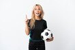 © luismolinero - Young Russian woman playing football isolated on white background pointing up and surprised