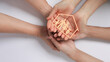 © Piya W. - Family  holding inclusive house icon showing love and care with family support concept on white background symbolizing safety