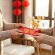 © Bahobank - Chinese New Year Family Giving Red Envelope at Home