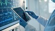 © adaptable_ Lark98A1 - A healthcare professional interacts with a tablet displaying medical data and graphs, wearing gloves in a modern clinical environment.