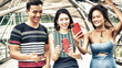 © jovannig - Three asian young friends enjoy outdoor time visiting a new city