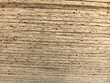 © Dzmitry - Textured layers of pressed wood reveal nature's design in daily life