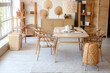 © Pixel-Shot - Interior of stylish room with wooden dining table and shelf units