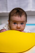 © Ametz - Curious infant observing surroundings during tummy time