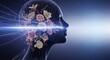 © Faisal - Woman's head with flowers and light beam symbolizing creativity and innovation in a dark background