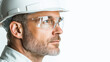 © Phirakhup - Male engineer white hard hat safety glasses closeup portrait confident expression