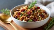 © Olga - Bowl of healthy farro salad with dried cranberries, fresh thyme, and rosemary. Concept of nutritious, gourmet, and whole grain food.