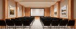 © Inna - The Conference Room with Rows of Chairs and Large Projection Screen for Presentations