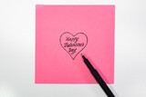 Handwritten Romantic Note on Pink Paper with Pen