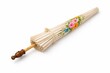 © Artcuboy - Closed Northern Thai Lanna paper umbrella folded and tied with woven strap carved teak handle bamboo shaft studio product photo isolated on white background