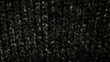 © Arthur - black wool knit texture macro view fibrous strands subtle sheen cozy dark abstract background