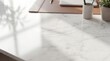 © Praphapan - An office desk with marble surface and office supplies such as a pen, a plant pot, and a pen holder. The desk offers a sense of minimalism and functionality