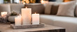 © TopMicrobialStock - White Candles on Tray in Warm Living Room Interior for Relaxing Mood