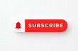 © Xohir  - A red subscribe button with a notification bell icon on a white background