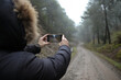 © Antonio Recena - A bearded man contemplates the landscape of trees and mist on a foggy winter day.