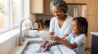 © Aurora Aesthetics - Black grandmother and granddaughter washing dishes family domestic life household support background copy space healthy lifestyle african american kitchen