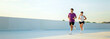 © muse studio - Jogging on an outdoor track during sunset with friends in warm weather