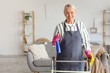 © Pixel-Shot - Mature woman with walker, detergent and rag at home