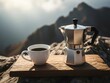 © Kamrul - A coffee cup and espresso maker on a wooden board outdoors on a rocky mountain top with a beautiful view