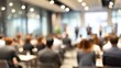 © Gianna - Unfocused Business Presentation Area - Gentle blur effect of a business presentation area with attendees. High quality
