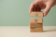 © Nim9ty  Pics - Wooden block stacking hand showing ai concept with ethics and law icons for thoughtful business ideas and artificial intelligence technology